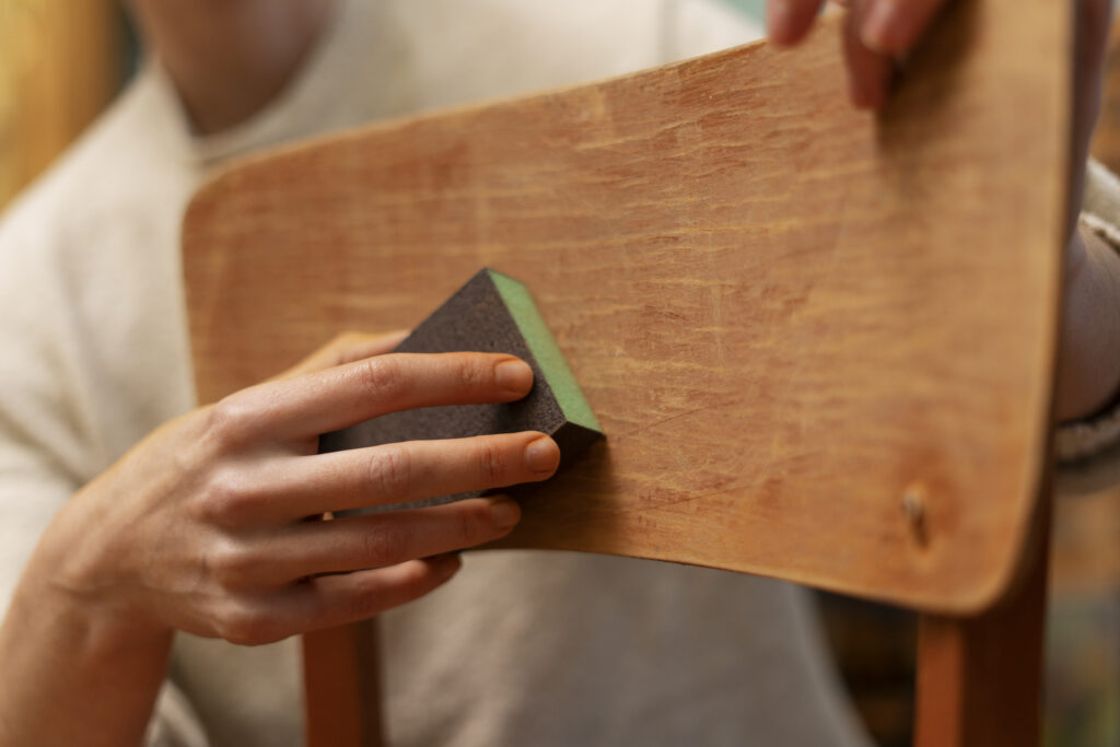 side-view-woman-restoring-wooden-chair